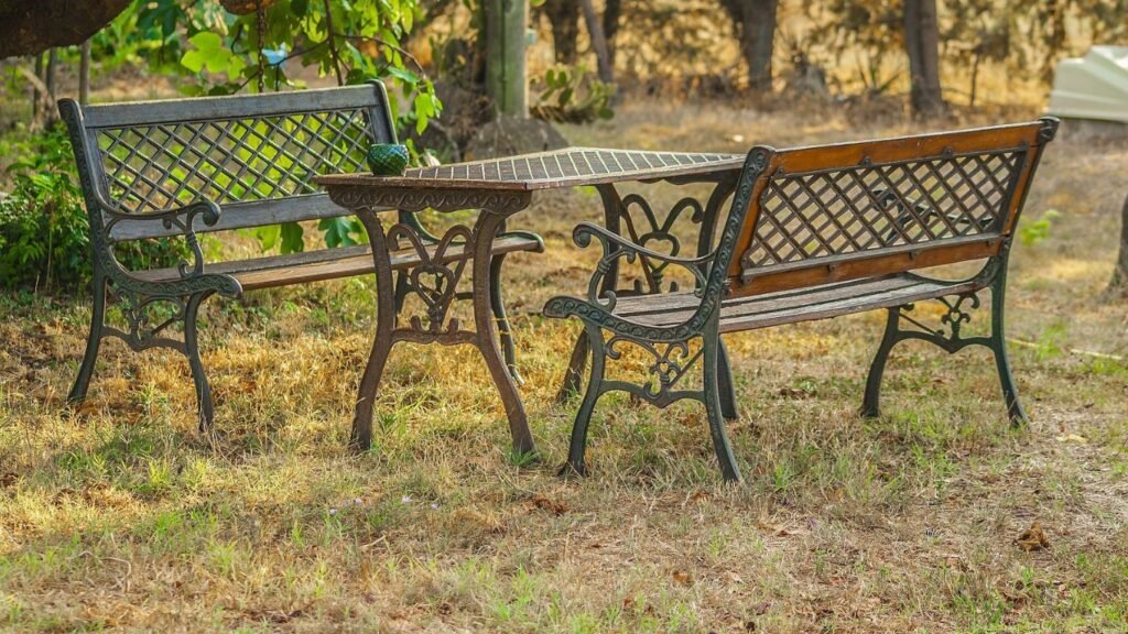 Durable wrought iron outdoor furniture set with table and chairs