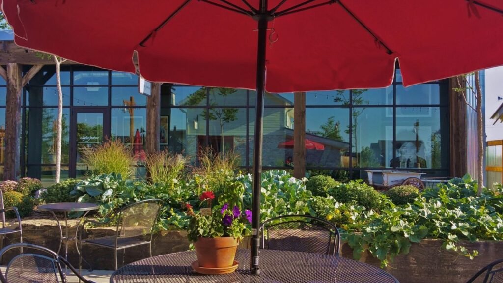 Canopy umbrella providing shade over Overstock patio furniture