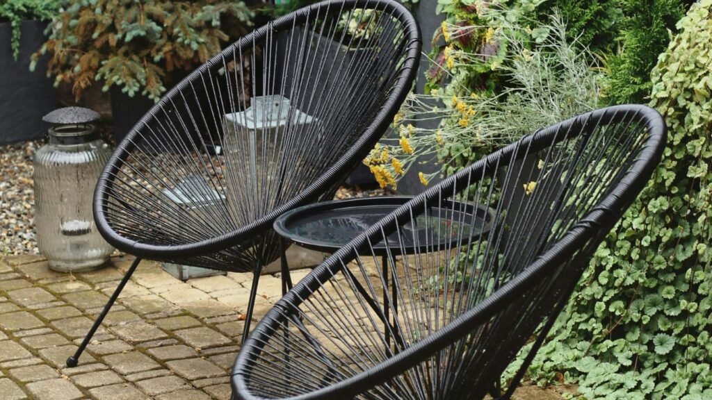 Modern wrought iron patio furniture with clean lines and a minimalist aesthetic